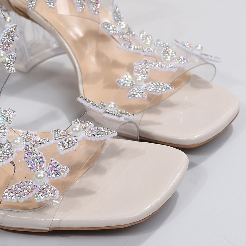 GS Slide | Casual sandalen met vlinder details en blokhak voor dames