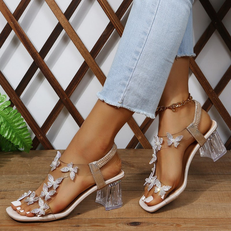 GS Slide | Casual sandalen met vlinder details en blokhak voor dames